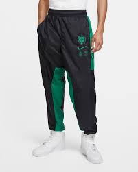 The official celtics pro shop at nba store has all the authentic celtics jerseys, hats, tees, apparel and more at the nba store. Boston Celtics Courtside Men S Nike Nba Tracksuit Pants Nike Com