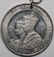 The right facing crowned bust of queen elizabeth ii wearing a high collared robe of state, collar of the order of the garter and the badge of. 1937 George Vi Queen Elizabeth Ii Coronation Medal Medals Km Coins King George George Vi Medals