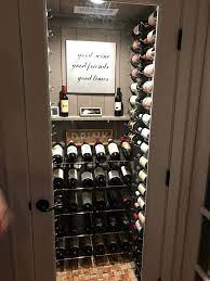 Turning A Water Heater Closet Into A Custom Wine Cellar In Coral Gables Fl Diy Glass Wine Cellar Diy Wine Cellar Wine Closet