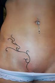 Don't miss our massive guide of tattoo designs that you don't want to miss! Lower Belly Tribal Tattoo With Thin Twisted Lines Tattooimages Biz