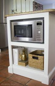 Options include building the microwave into cabinetry, installing it inside an island, recessing the unit into the wall, and more. Our Kitchen Island With Microwave We Added A Built In Shelf Driven By Decor