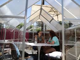 Established in 2018, greenhouse cafe in central illinois is a unique eatery that is perfect for spring and summer. In Los Angeles A Cafe Shields Diners From Covid 19 With Private Greenhouses News Photos Gulf News