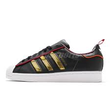 It has a distinctive shell toe design with coated leather upper. Adidas Originals Superstar Cny 2021 Black Gold Red Men Women Unisex Shoes S24184 Ebay