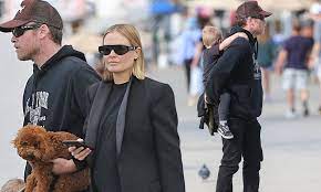 Lara worthington debuts striking new orange hair as she trades in her iconic and this week, lara worthington (née bingle) debuted a drastic hair change, flaunting a. Pregnant Lara Bingle Watches On As Sam Worthington Skateboards With Sons Rocket And Racer In La Daily Mail Online