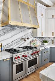 Tumbled marble backsplashes are extremely versatile and can be found in contemporary and classic kitchens alike. 15 Full Height Kitchen Backsplashes Ideas Kitchen Kitchen Backsplash Kitchen Marble