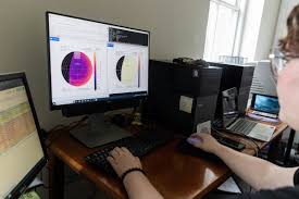 Shauna Shepard '25, Luke Chapman '25 and professors Katrin Schenk  (pictured) and Peter Sheldon have spent their summer studying satellite  constellations—networks of satellites that work together to deliver a  global service, like