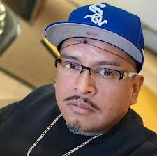 Why is the AC in my Denali not blowing ice cold at idle?