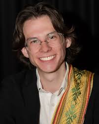 Ian Plansker honored by choir before studying master of music in Holland