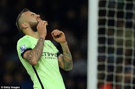 Actually, i'm sure there are a number of players with religious tattoos, but none as big as the one nico otamendi has on his thigh. Nicolas Otamendi Says Tattoos And Beard Make Him Look Aggressive And Add To Tough Guy Image Daily Mail Online