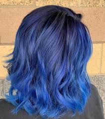 Creating a shade of dark blue requires mixing darker shades of green and violet and painting them on dark hair. 25 Dark Blue Hair Colors For Women Get A Unique Style