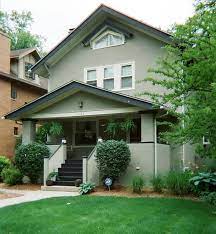 Light colored doors, like a yellow front door, a green front door, or an orange front door, can all reflect the sun's rays away from your house. Green Stucco Exterior House Colors Novocom Top