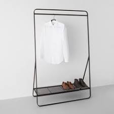 This dual bars horizontal & vertical telescope style 3 tiers stainless steel clothing garment shoe rack combines clothing airing holder and storage the skinny poles that make up the shelves fall out every time i touch the thing. 24 Metal Clothes Rack Ideas Clothing Rack Metal Clothes Rack Garment Racks
