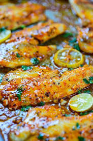 This Spicy Lemon Garlic Baked Tilapia Takes All Of 5 Minute Of Preparation Time Before You Pop It In The Oven Pai Tilapia Dinner Recipe Recipes Tilapia Dinner