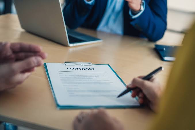How Should a Business Update Its Contracts in Response to New Regulations?