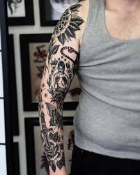 Getting this kind of tattoo means you probably will choose an image that is in some way iconic or easily recognized by a viewer. Black And White Traditional Tattoo Sleeve Tattoo Designs Ideas