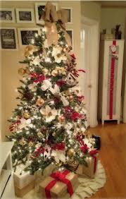 The tree skirt is also kept according. Red Gold White And Burlap Christmas Tree Green Christmas Tree Decorations Gold Christmas Tree Decorations Burlap Christmas Tree