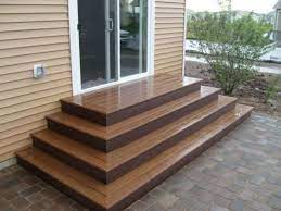To install a sliding patio or deck door, first decide a practical, aesthetically logical and structurally sound location for the entranceway. This Is Nice Patio Stairs Patio Steps Trex Steps