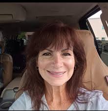 What hairstyle and makeup would suit a 66-year-old woman?