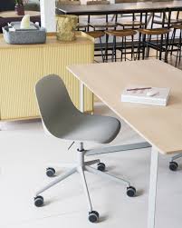 Timeless And Versatile Interior Inspiration From Muuto The Fiber Side Chair With Swivel Base And Castors Is A Grand Side Chairs Chair Blue Chairs Living Room