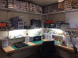 His Side Of Office Just Add Airbrush Station It S More Like A Work Shop Assembly Area Computer Repair Workbench Hobby Room Hobby Desk