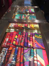 I Found This Display Of Scarves At An Hermes Store In Amsterdam Each Scarf Is Brightly Colored And Neatly Organized Scarf Display Boutique Display Hermes Shop