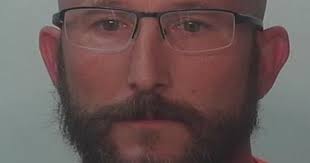 Former police officer wanted for allegedly exposing himself