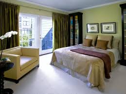 I'm wanting to paint our bedroom similar to the colour in the attached photo.is it sage green or olive green.and what is the difference? Eye For Design Olive Green Interiors