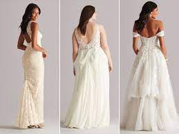 The french bustle is done by tying together matching ribbons between the lining of the dress and the train. Wedding Dress Bustles 101 The Ultimate Guide Video