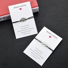 First pick two halves that make up an image and lay them out like so: Make A Wish Card Infinity Love Heart Charms Bracelets For Women Men Lotus Tree Of Life Black Elastic Rope Yoga Bracelet Jewelry Buy At The Price Of 0 61 In Aliexpress Com