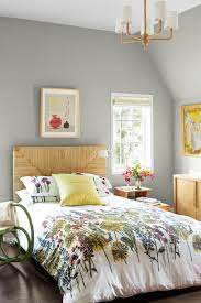 Elegant bedroom is furnished with a greek key bed dressed in light gray bedding and paired lit by an oly studio serena bowl chandelier. 15 Grey Bedroom Paint Colors Decorating Ideas For Bedrooms