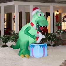 Check spelling or type a new query. Amazon Com Christmas Decoration Lawn Yard Inflatable T Rex Dinosaur With Santa Hat And P Christmas Lawn Decorations Christmas Inflatables Christmas Party Prop