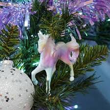 Ditch your old star topper and get the unicorn horn topper instead for a more magical. 11cm Rainbow Unicorn Christmas Tree Decoration