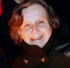 Can someone edit my mom's mouth, she is beautiful but have no teeth. Thank  you