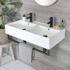 White premium cultured marble gives your bathroom space a modern update. Milano Elswick White Modern 820mm X 420mm Rectangular Double Wall Hung Basin With Black Towel Rail