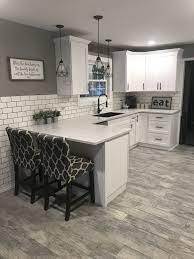 Cabinets made from the most premium hardwood. White Shaker Cabinets With Solid Surface Countertops And Flat Black Handles Kitchen Remodel Small Diy Kitchen Remodel Home Decor Kitchen