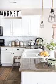 But when it comes to a farmhouse kitchen, seasonal florals are an absolute must. Diy Whitewashed Faux Brick Backsplash Bless Er House