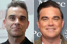 Williams has had 14 uk number one singles as of 2020 (not including as. What S Happened To Robbie Williams Face The Singer Looks Very Different As He S Pictured With Wife Ayda Field Mirror Online