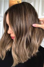 Mousy Brown Hair Is Having A Moment So Brunettes Everywhere Can Finally Take A Break Mousy Brown Hair Hair Styles Brown Blonde Hair