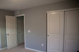Crisp white walls go well with black cabinets and black granite countertops for a striking, bold look. 17 Shades Of Grey I Could Do A Lot In Fifteen Minutes