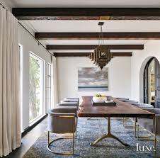 Create a modern industrial look to your dining space or kitchen area with this rectangular dining table in a stylish gray finish, supported by sleek track chrome metal legs with an x base design. Once Home To A Croatian Countess A Bay Area Reno Maintains International Flair Luxe Interiors Design