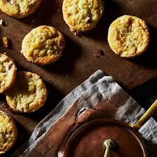 A small round cake, sometimes with dried fruit in it and often eaten with butter, jam and cream spread on it topics food c2. The British Scone Debate So Big The Queen Got Involved