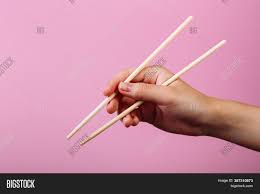 Place your thumb onto the chopstick to give it added support. Instruction How Hold Image Photo Free Trial Bigstock