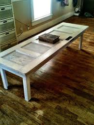 Lay the door face down on a drop cloth. Antique Door We Painted And My Husband Made Into A Coffee Table Door Coffee Tables Coffee Table Old Door Coffee Table