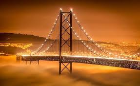 The bridge is a distinctive landmark of lisbon and crossing the ponte 25 de abril bridge makes for a fantastic entrance to lisbon. Pin On Lisbon