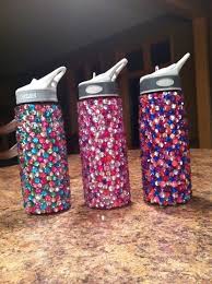 I Bought Some Cute Water Bottles At Dollar Tree And We Decorated Them With Rhinestones The Girls Did Their Initials Du Diy Rhinestone Crafty Diy Dance Crafts