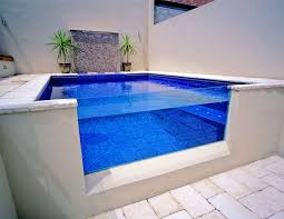 Creating An Oasis In A Sloped Backyard Blue Haven Pools