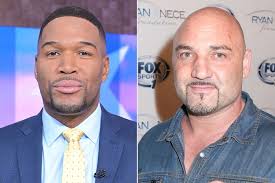 Michael Strahan's Fox Co-Host Defends Him After National Anthem Controversy