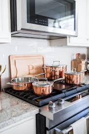 6 Things You Need When You Move Into A New House Haute Off The Rack Kitchen Appliances Rose Gold Kitchen Modern Grey Kitchen