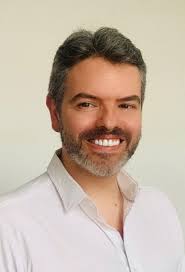 How does the Blockchain boom affect the software industry and what concrete  effects will it have throughout this decade?