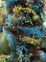 Last week, i shared peacock ornaments decorate chandelier at christmas. How To Decorate A Peacock Themed Christmas Tree